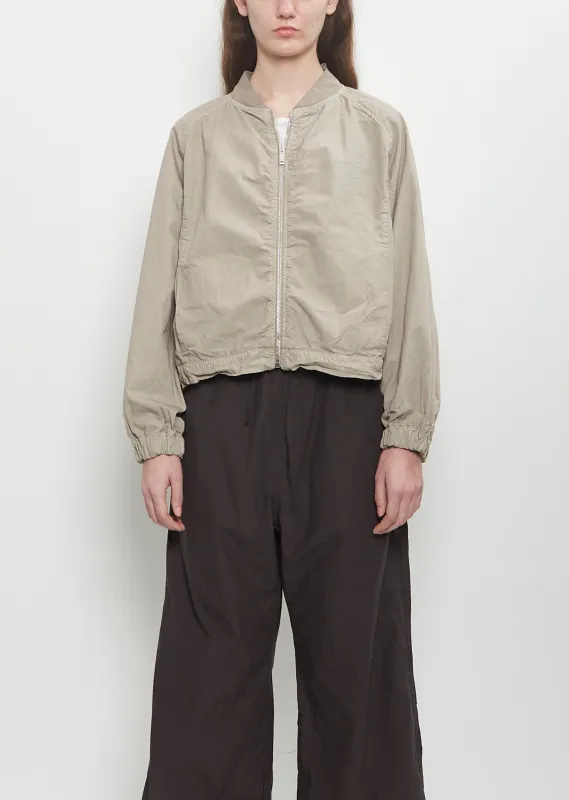 Cotton Canvas Bomber Jacket — Stone sold by La Garconne