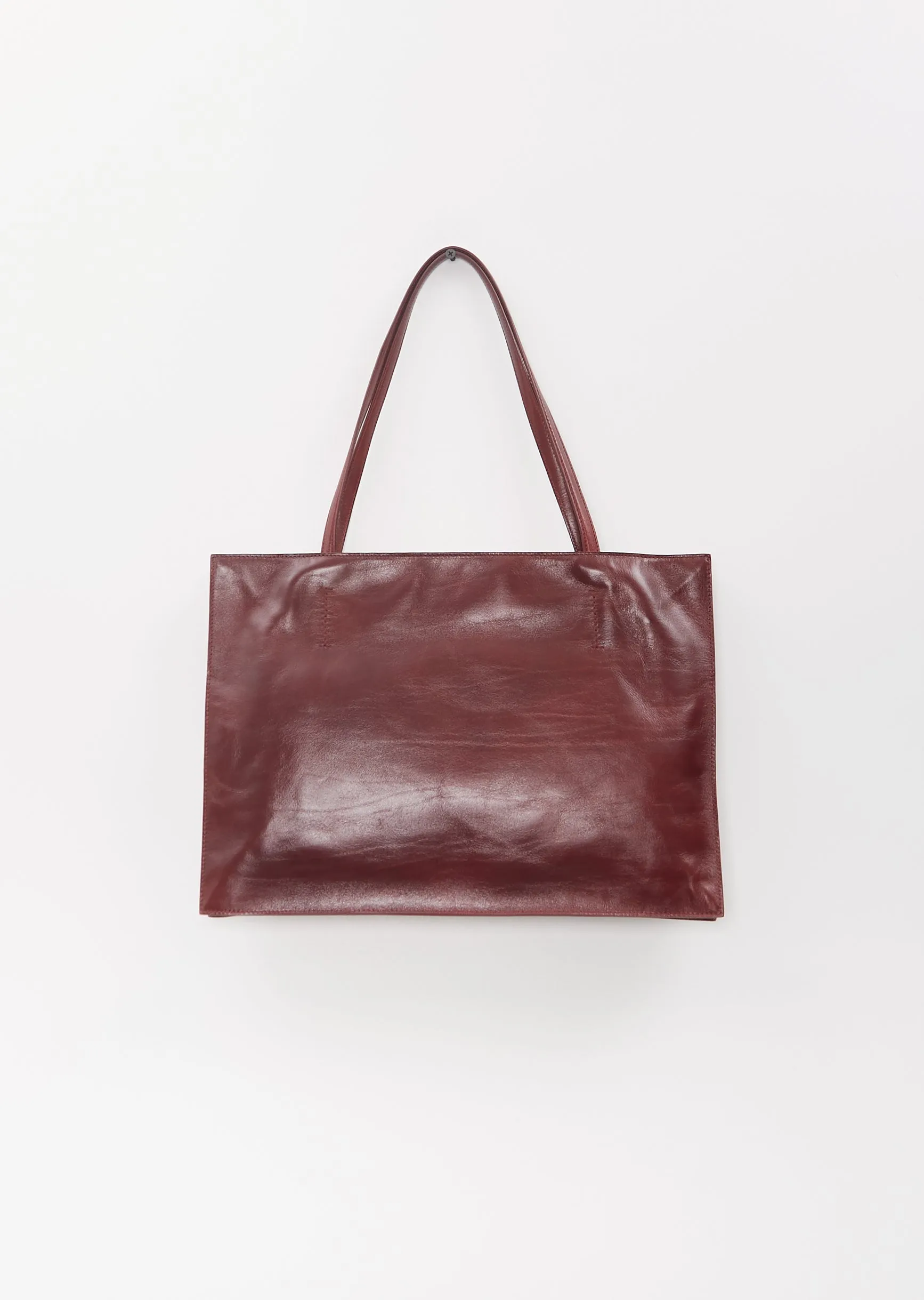 Yumi Leather Sling — Ruby sold by La Garconne