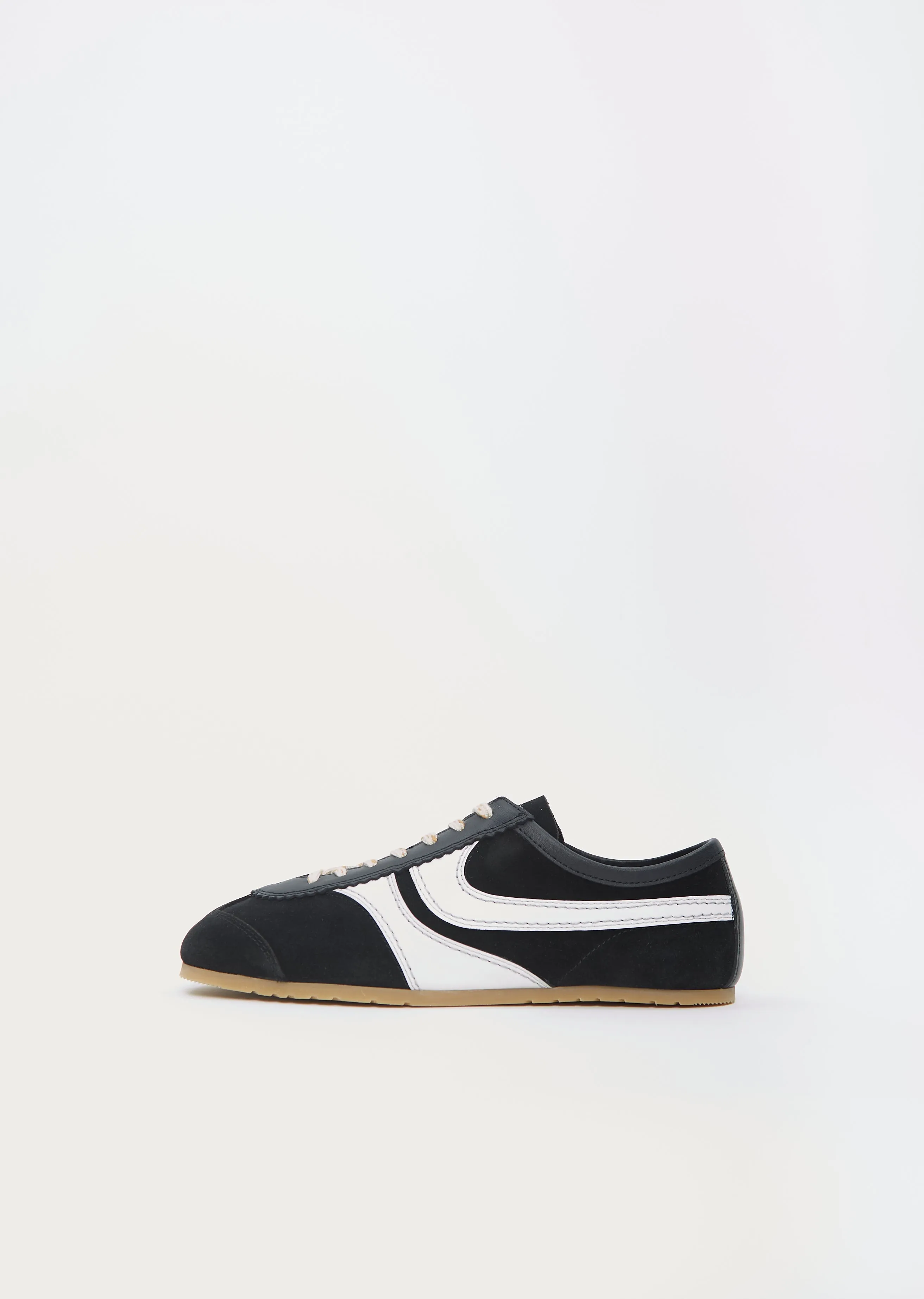 Suede Trainer — Black sold by La Garconne