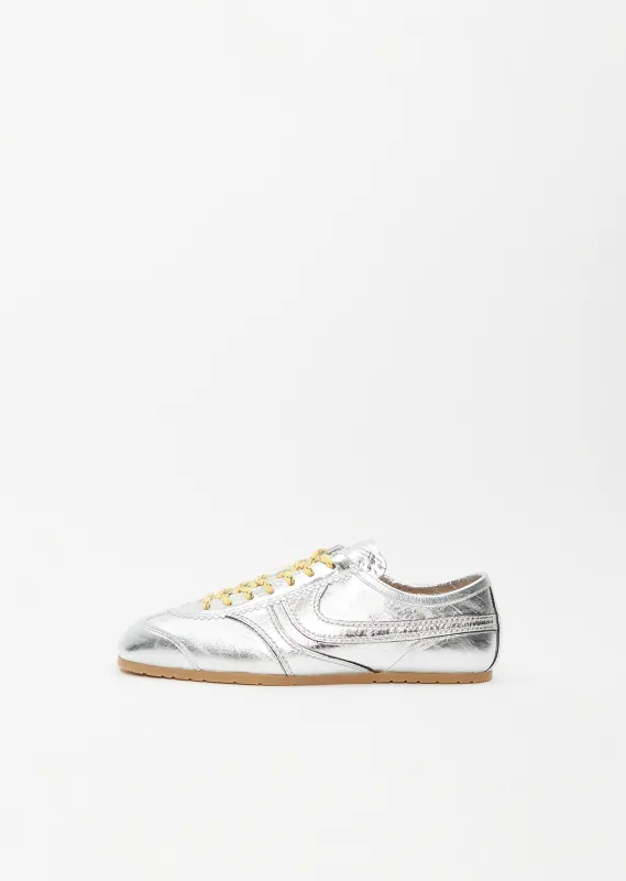 Leather Metallic Trainer sold by La Garconne