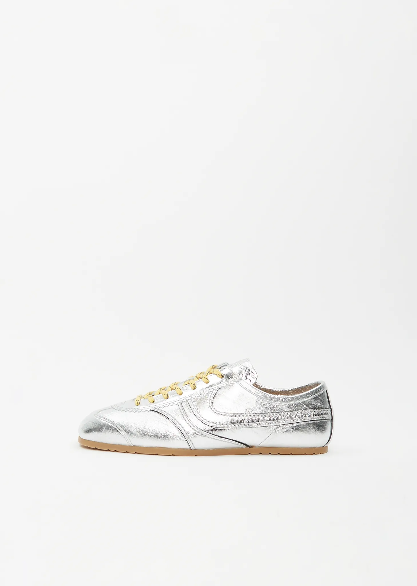 Leather Metallic Trainer sold by La Garconne