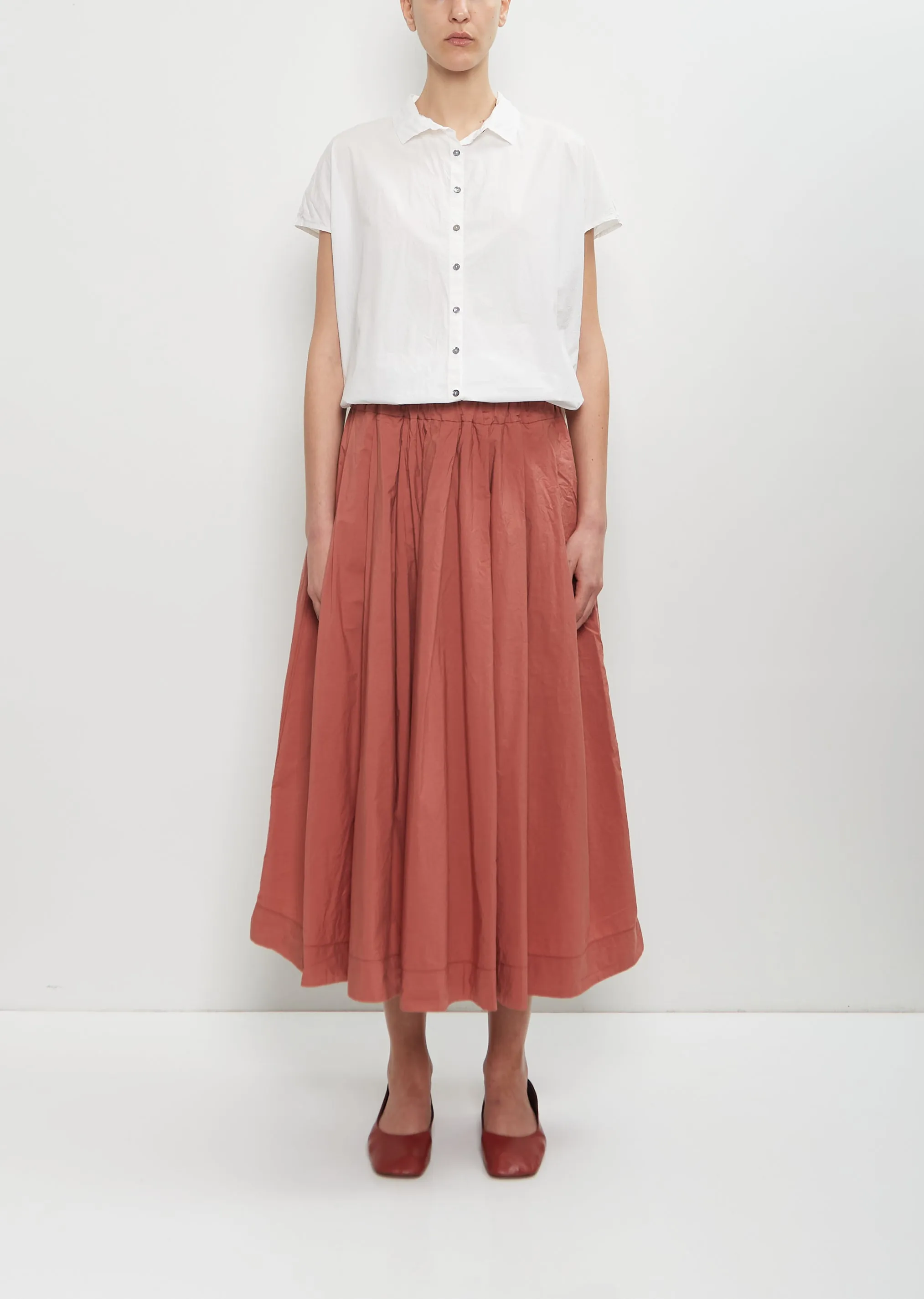 Tissue Cotton Pleated Long Skirt — Coral sold by La Garconne