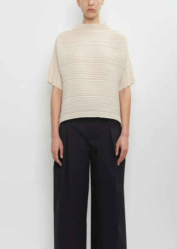 Sheer Bounce Knit Shirt sold by La Garconne