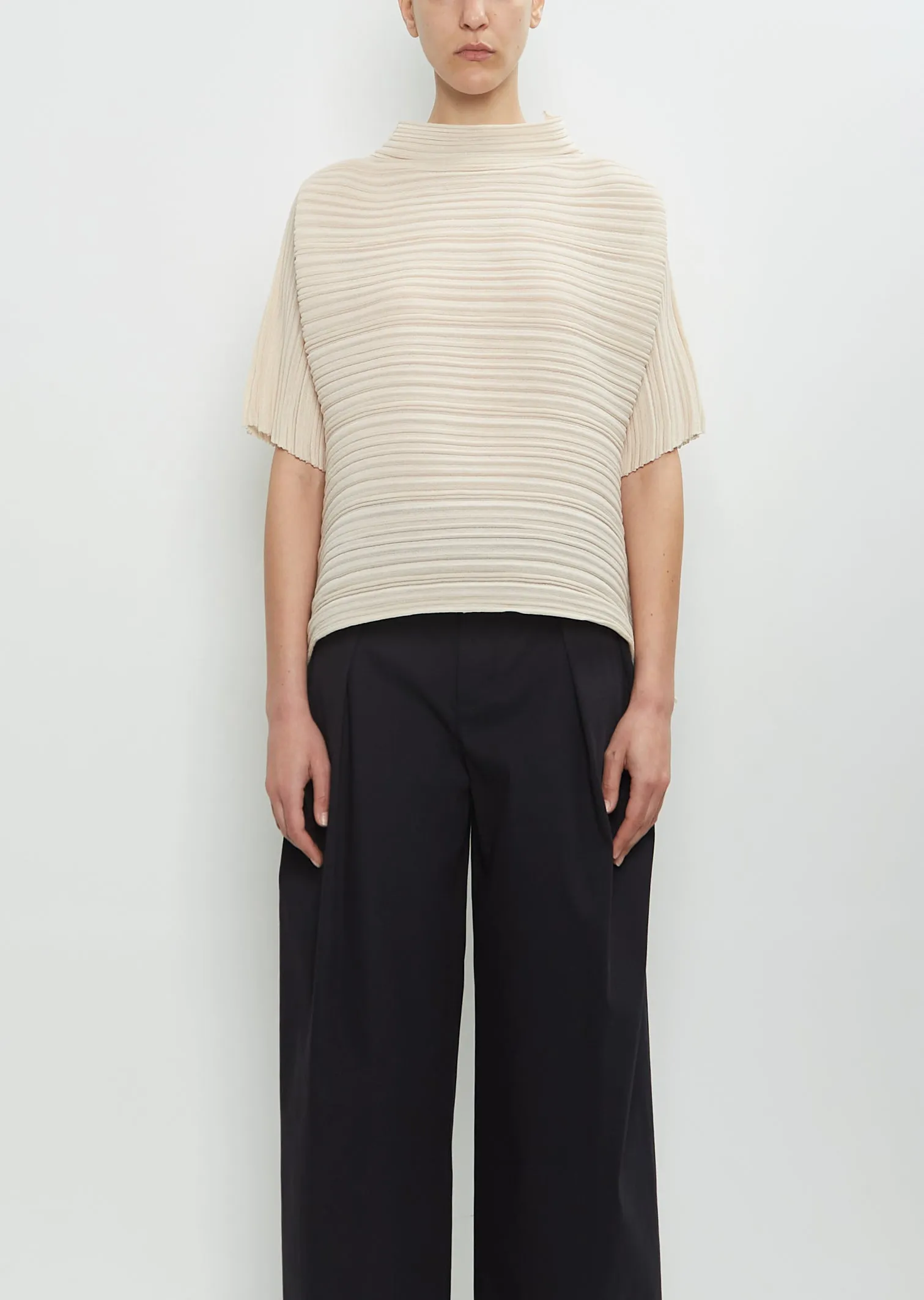 Sheer Bounce Knit Shirt sold by La Garconne