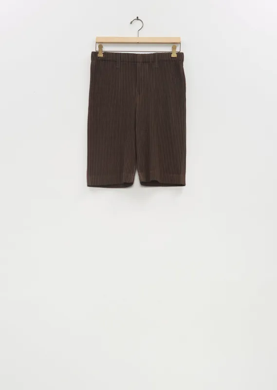 Tailored Pleats 2 Shorts — Mud Brown sold by La Garconne