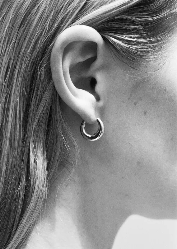 Silver Tiny Essential Hoops sold by La Garconne