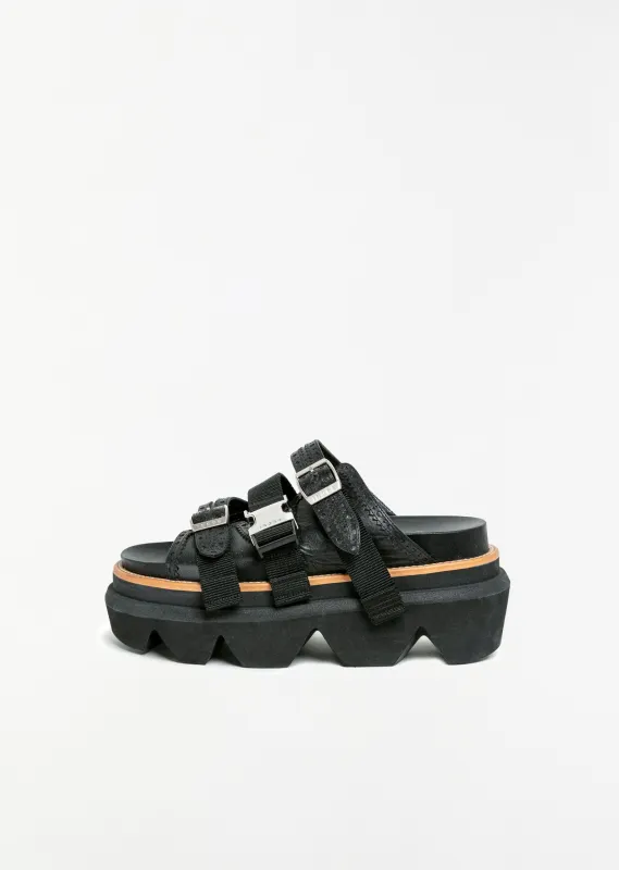 Wingtip Leather Sandals sold by La Garconne