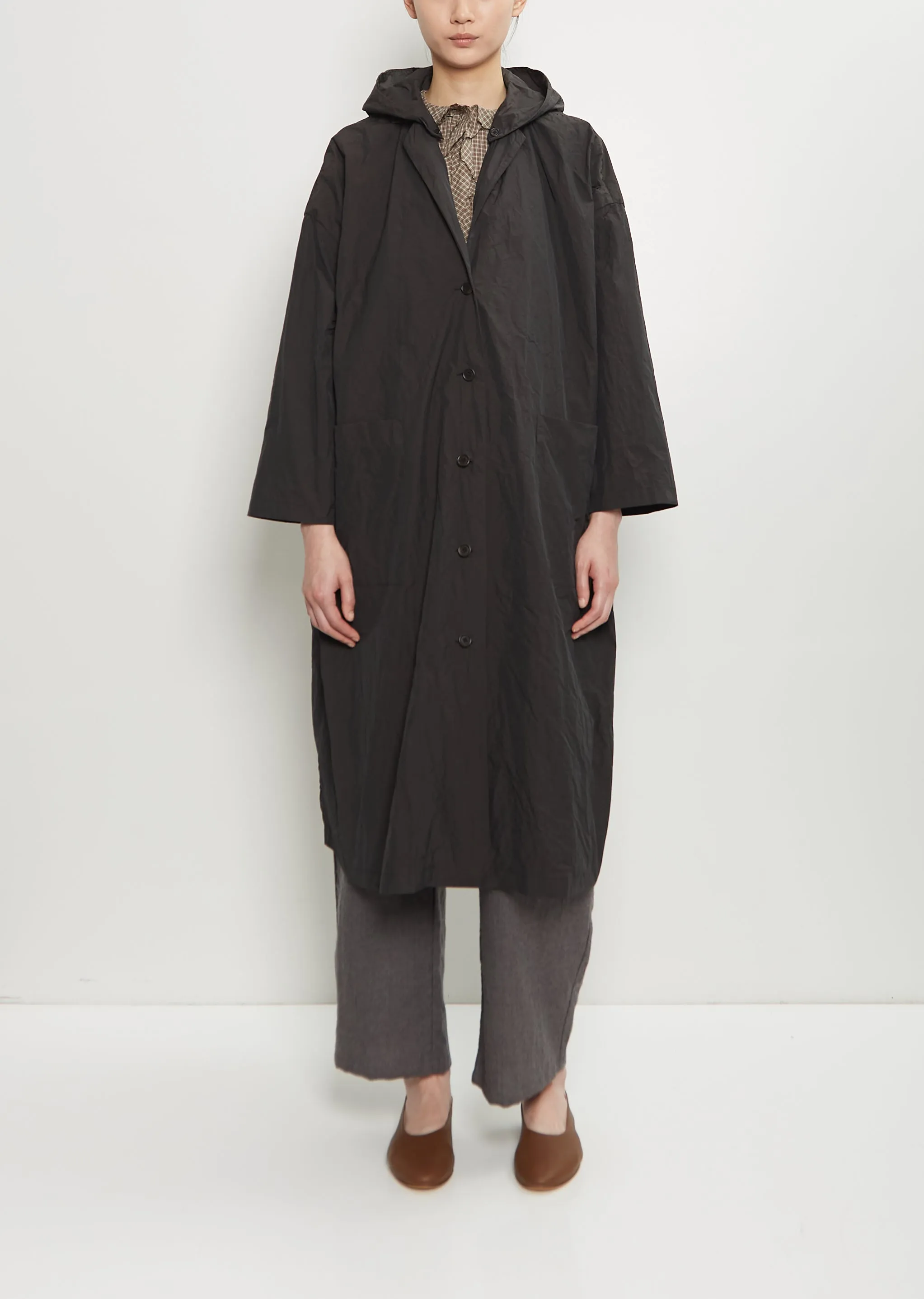 Technical Hooded Light Coat sold by La Garconne