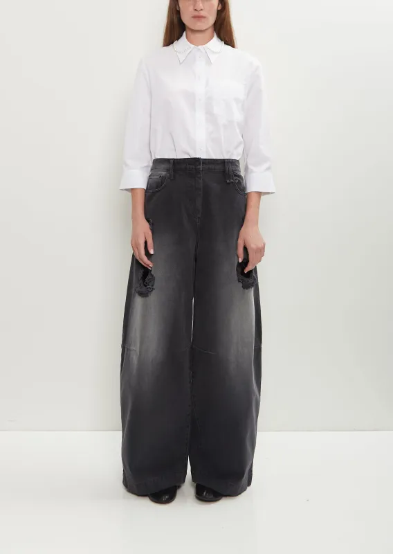 Distressed Puddle Jeans — Distressed Black sold by La Garconne