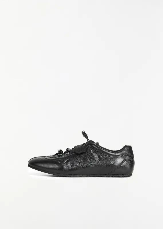 Blaise Metallic Leather Sneaker sold by La Garconne