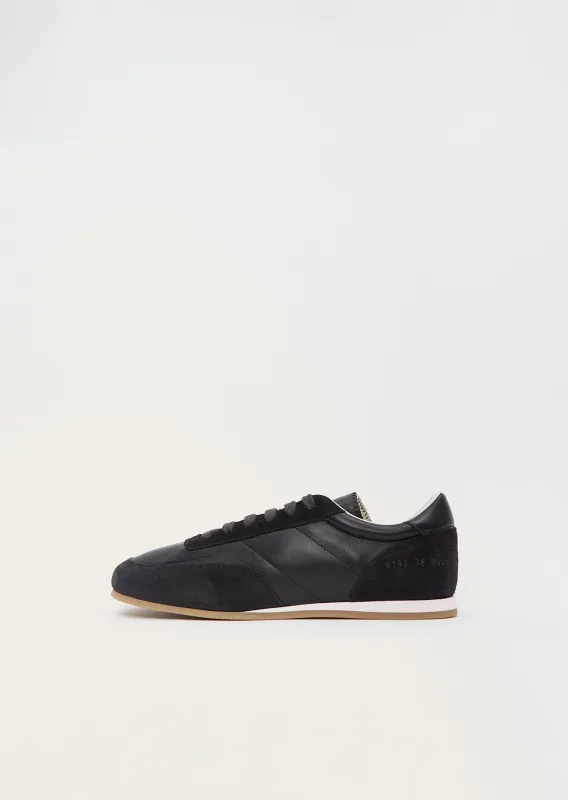 Minimal Suede Nappa Runner — Black sold by La Garconne