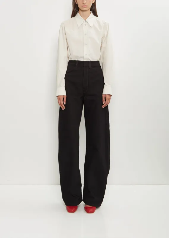 High Waisted Curved Denim Pants — Black sold by La Garconne