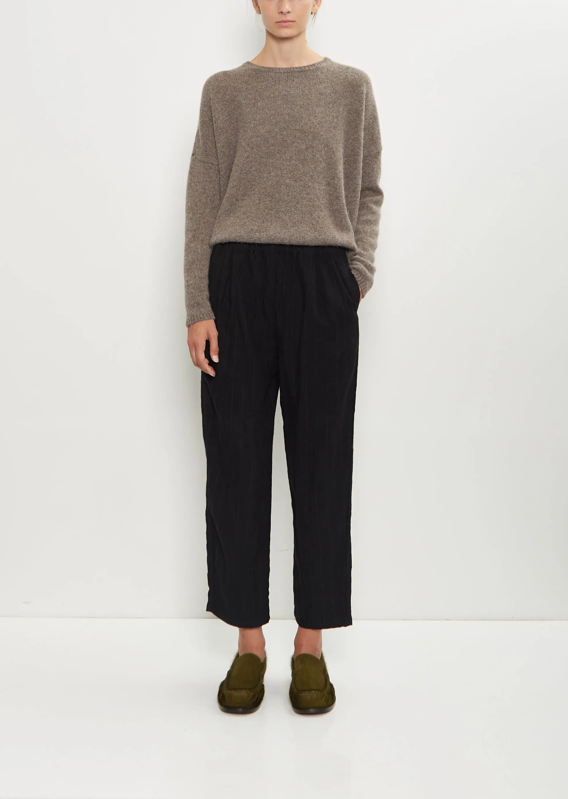 Linen Wool Pinstripe Pleated Tapered Pant — Black sold by La Garconne