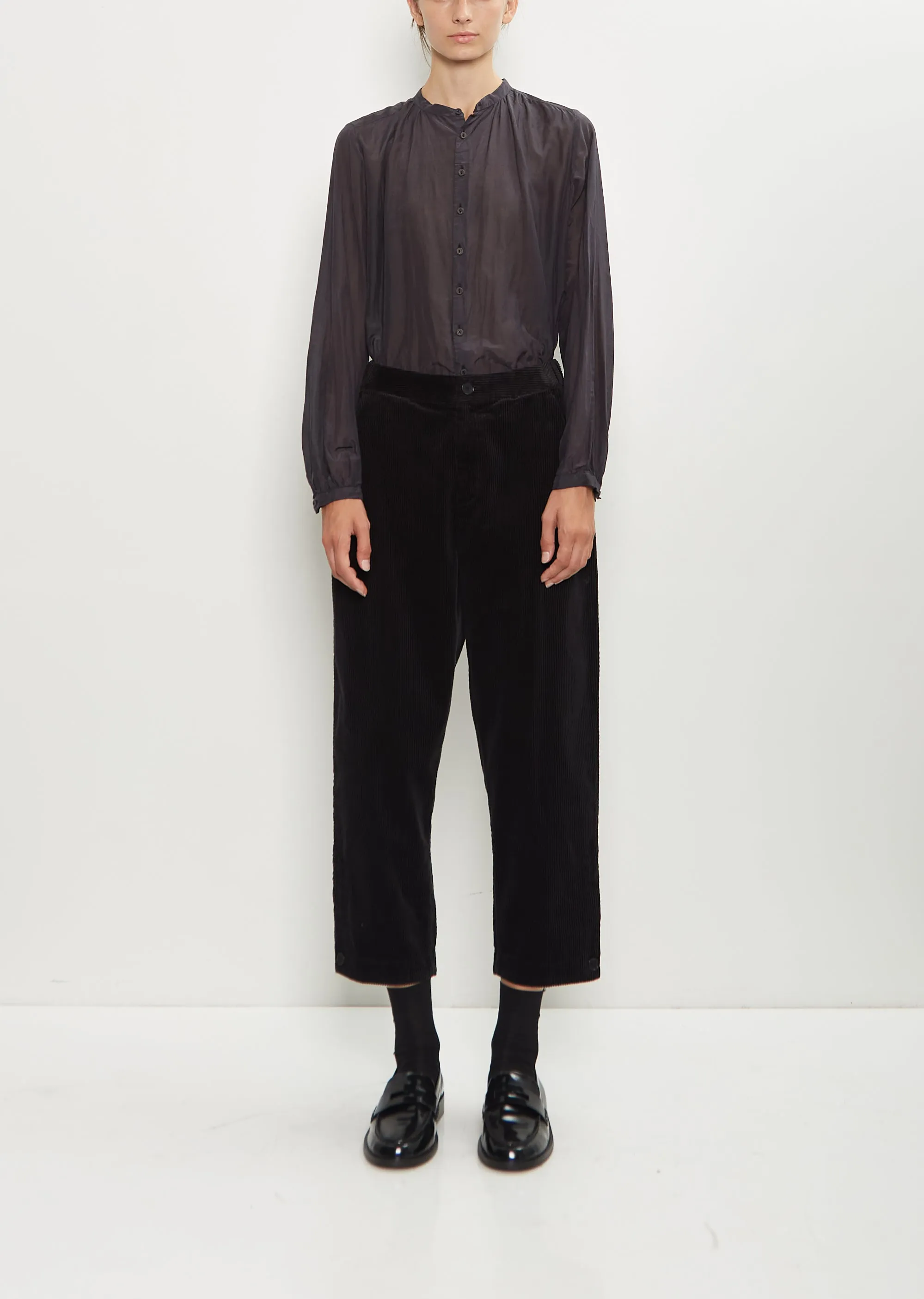 Corduroy Tapered Pants — Black sold by La Garconne