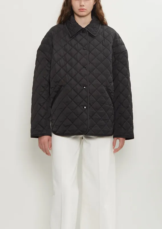 Collared Quilted Poly Jacket sold by La Garconne