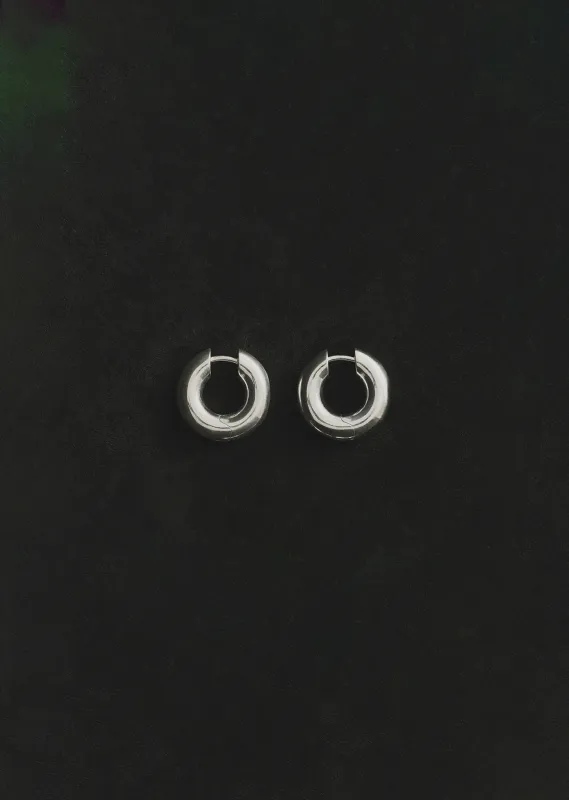 Large Silver Bagel Hoops sold by La Garconne