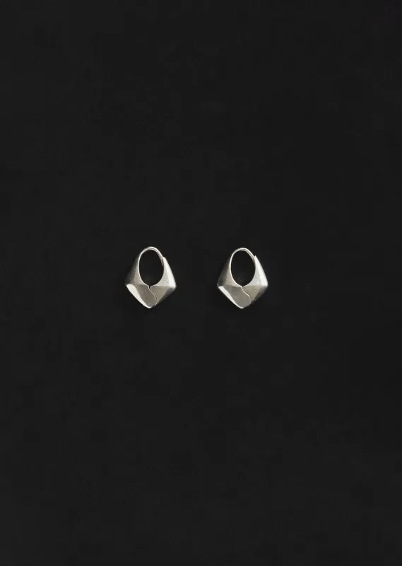 Small Silver Pyramid Hoops sold by La Garconne