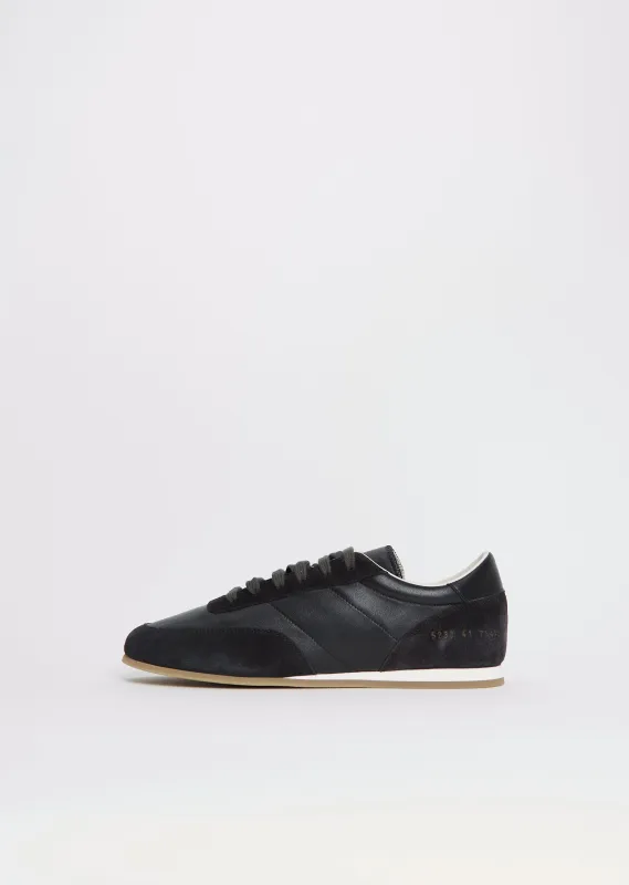 Minimal Suede Nappa Runner sold by La Garconne