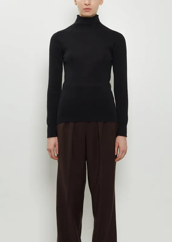 Ribbed Wool High Neck Jumper sold by La Garconne