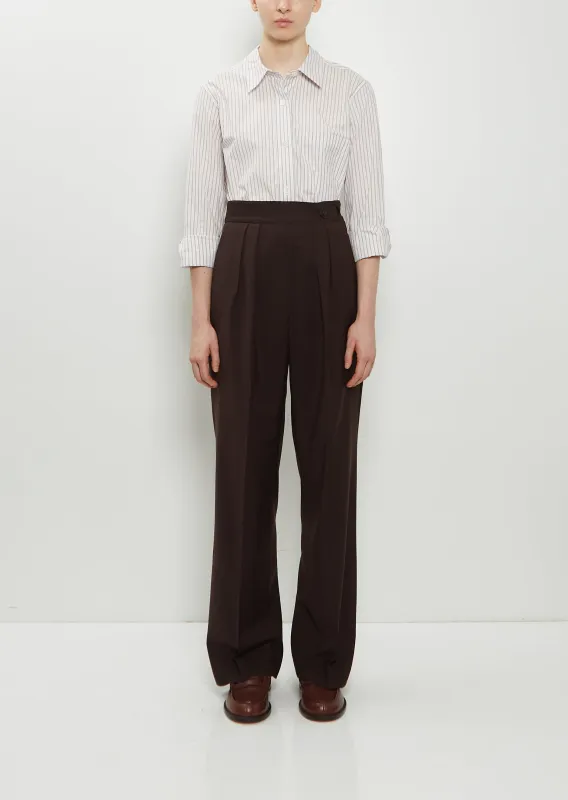 Side Closure Wool Trousers sold by La Garconne