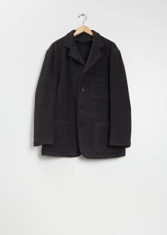 Stretch Wool Herringbone Jacket sold by La Garconne