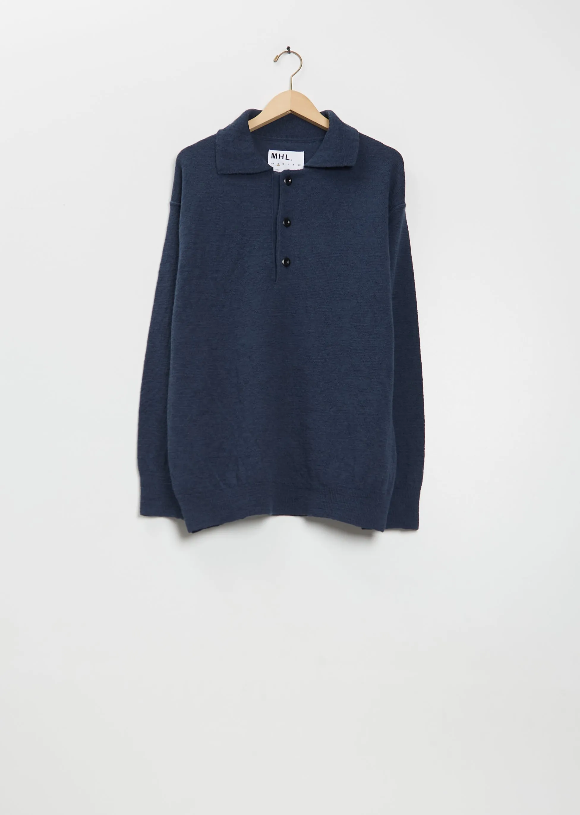 Oversized Wool Knitted Polo sold by La Garconne