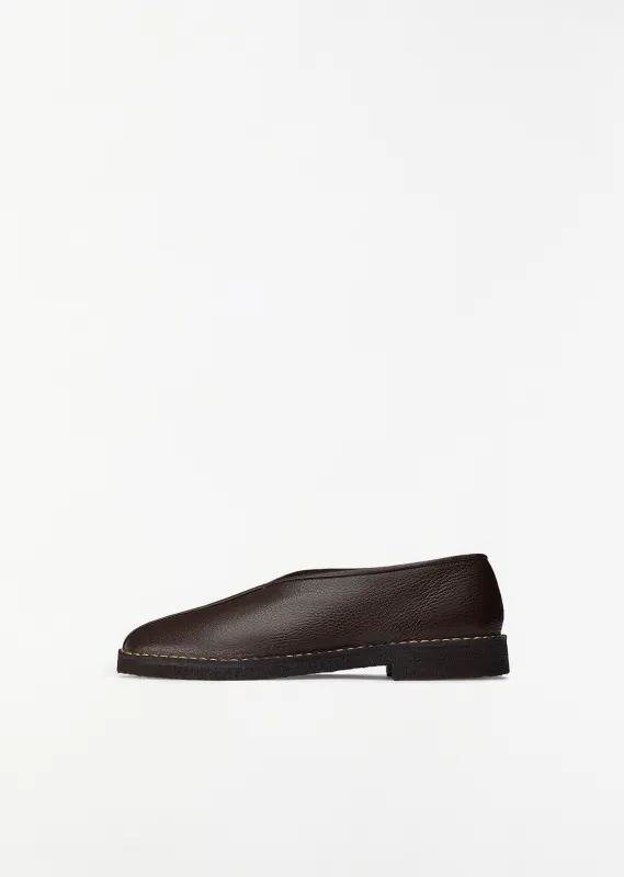 Piped Leather Crepe Slippers sold by La Garconne