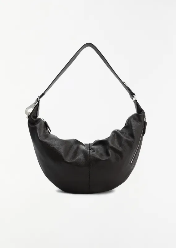 Quiver Clip Leather Bag sold by La Garconne