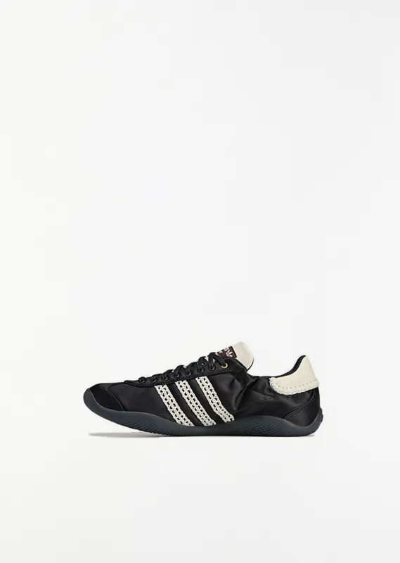 Karintha Lo Satin Sneaker — Core Black / Cream White sold by La Garconne