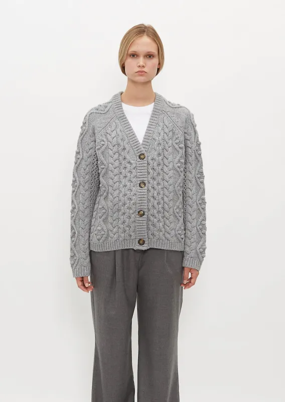 Kuma Merino Wool Cable Knit Cardigan sold by La Garconne