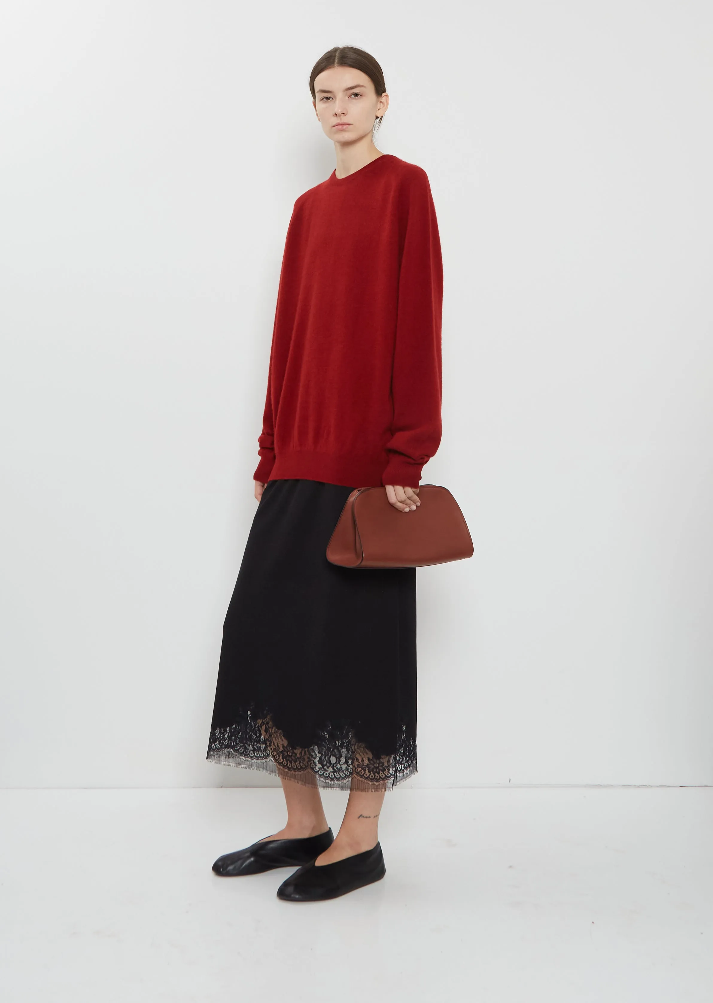 Peggy Saddle Leather Clutch — New Burgundy sold by La Garconne