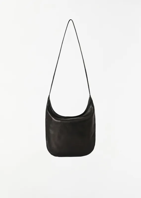 N/S Izzy Shoulder Bag — Black made by The Row