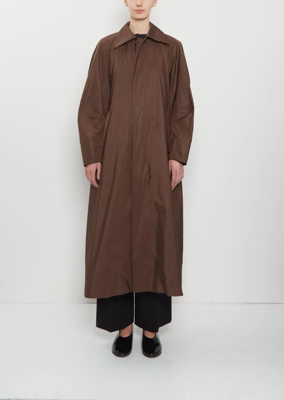 Akimbo Paper Coat sold by La Garconne