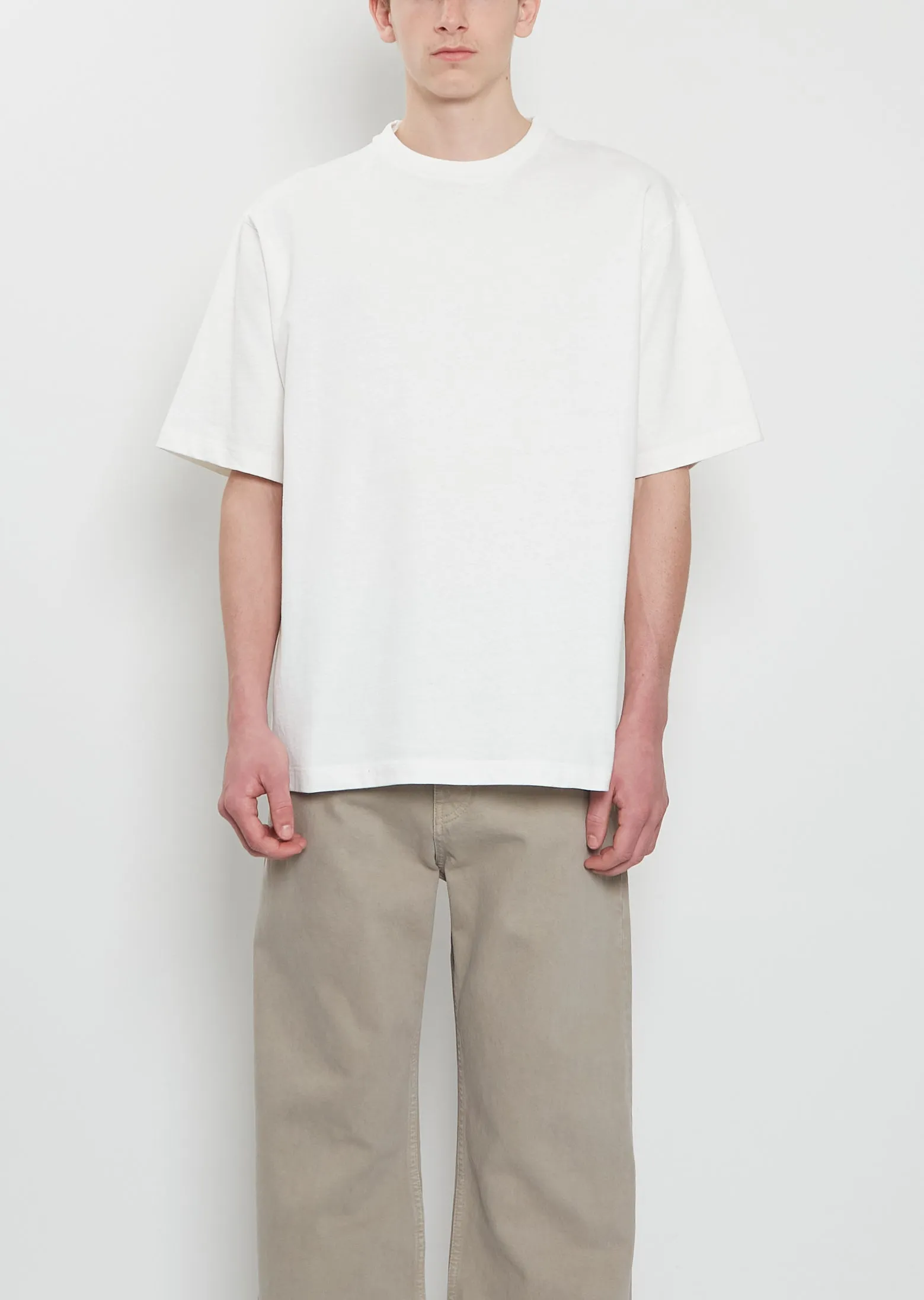 Steven Cotton Top — White sold by La Garconne