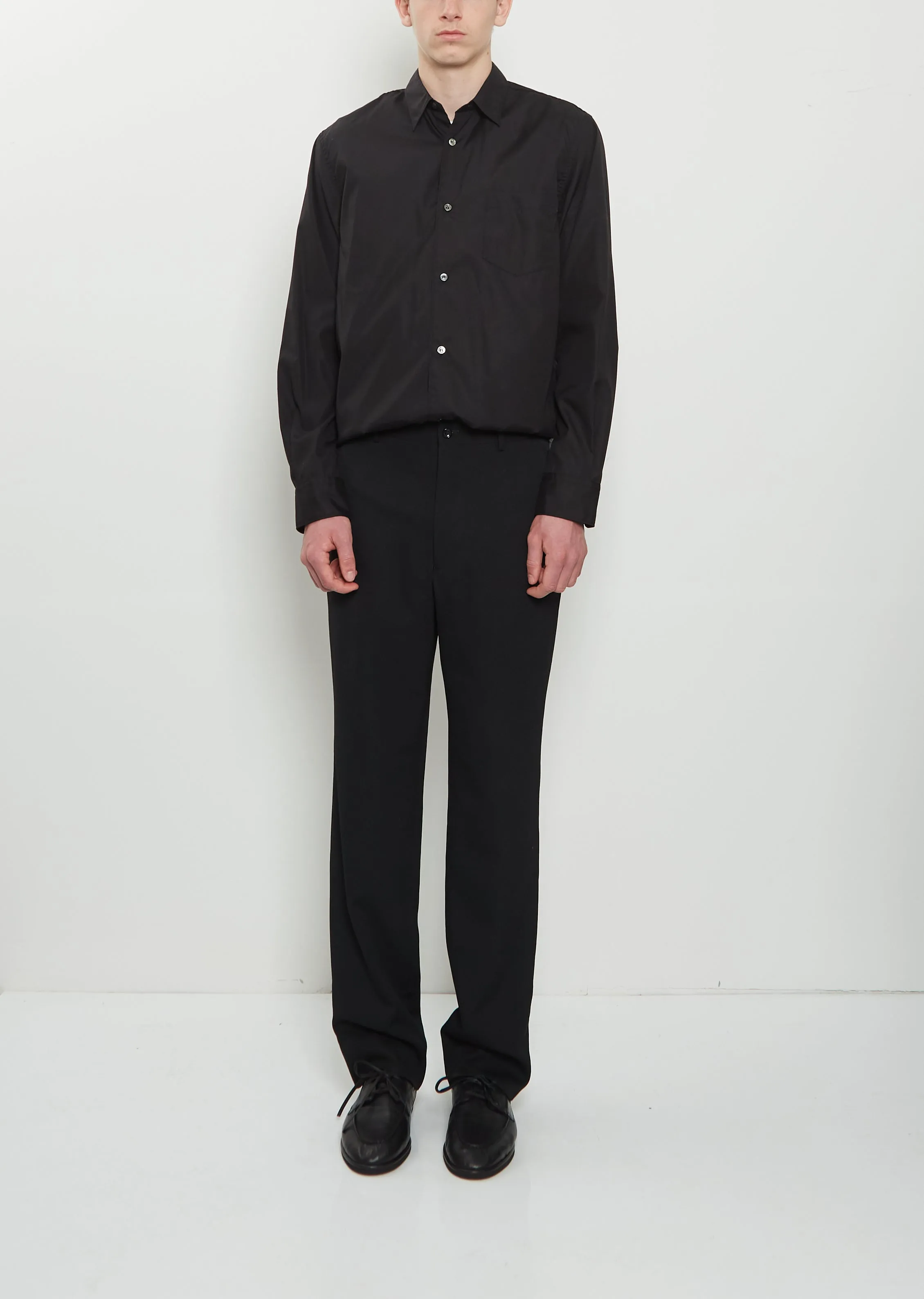 Wool Tapered Pants — Black sold by La Garconne