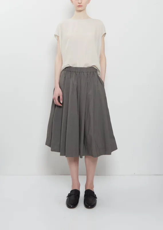 Ultra Light Canvas Pleated Skirt — Anthracite sold by La Garconne