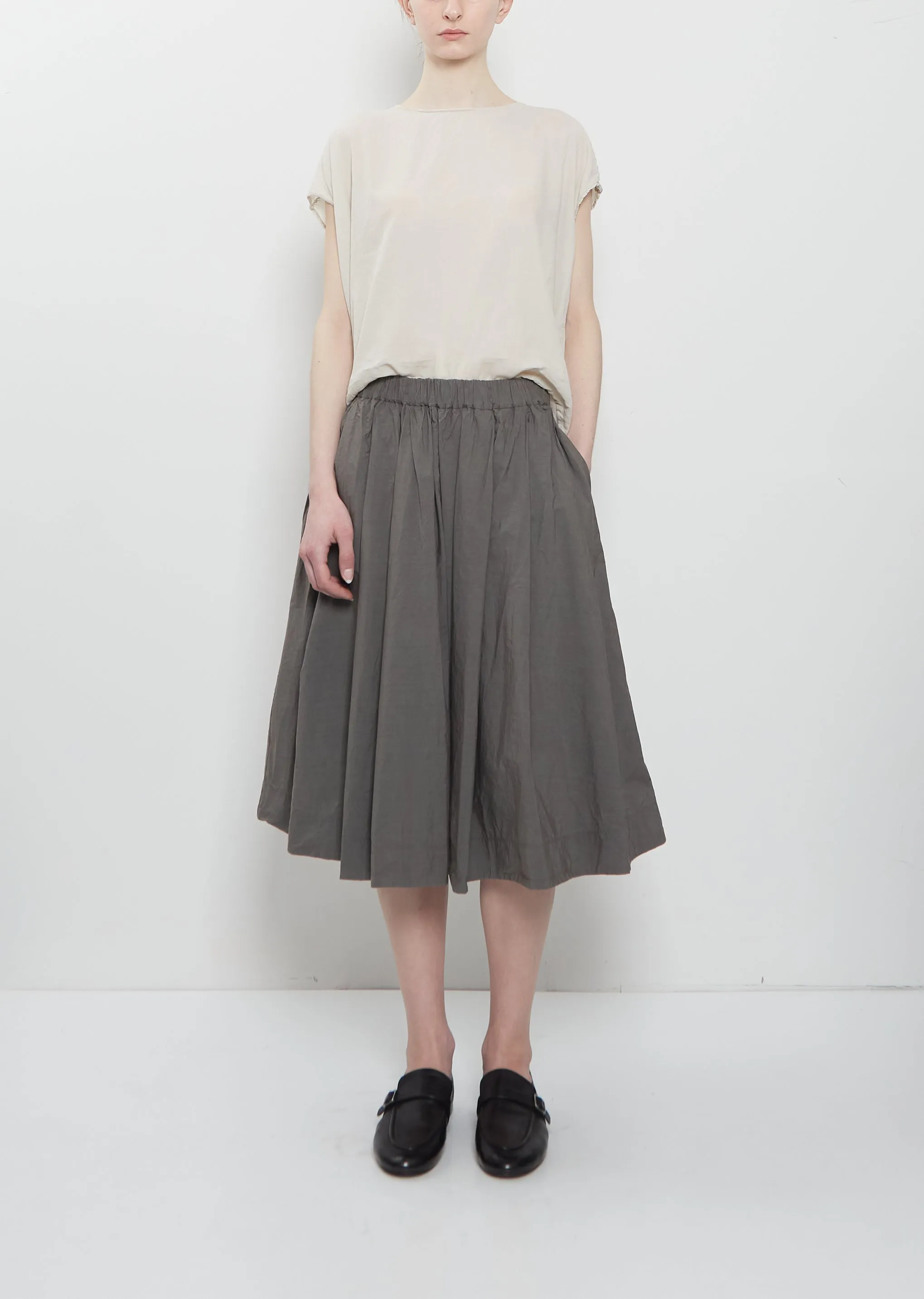 Ultra Light Canvas Pleated Skirt — Anthracite sold by La Garconne
