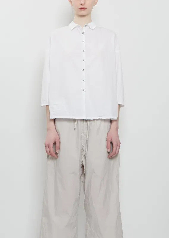 Ultra Light Canvas Short Collar Shirt — White sold by La Garconne