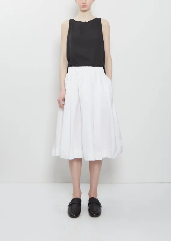 Ultra Light Canvas Pleated Skirt — White sold by La Garconne