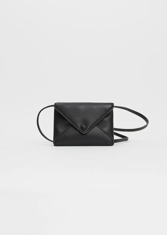 Mini Leather Envelope — Black made by The Row