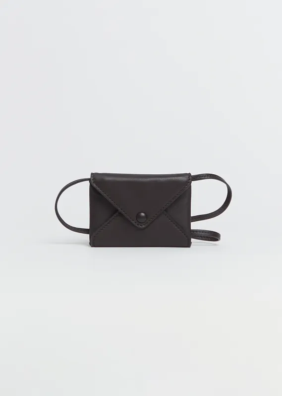 Mini Leather Envelope — Dark Brown made by The Row