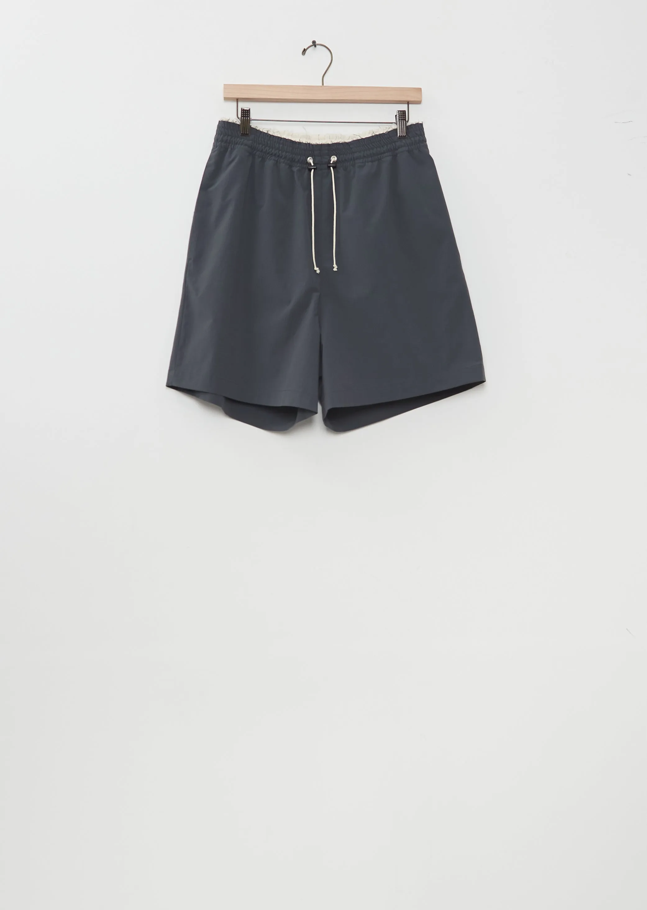 Knee Technical Shorts — Petrol sold by La Garconne