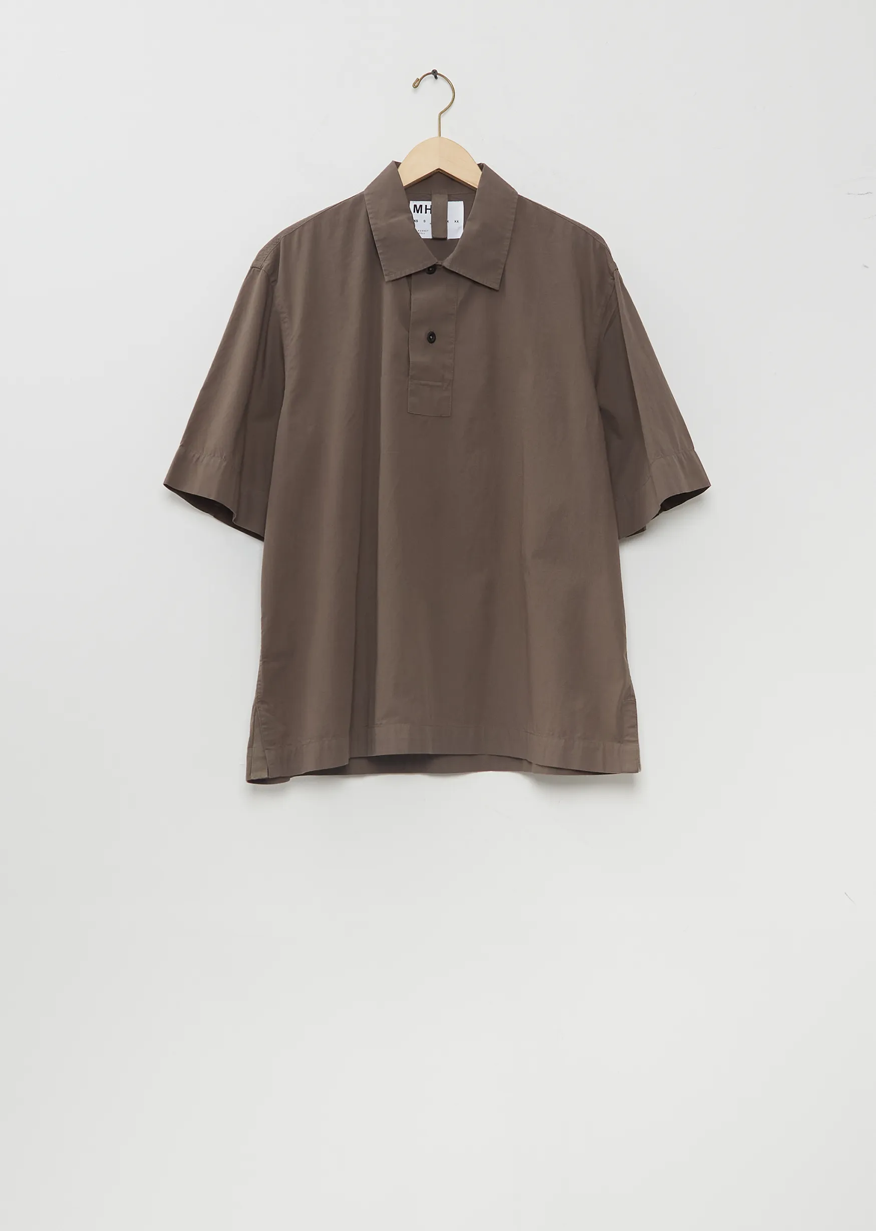 Offset Placket Polo sold by La Garconne