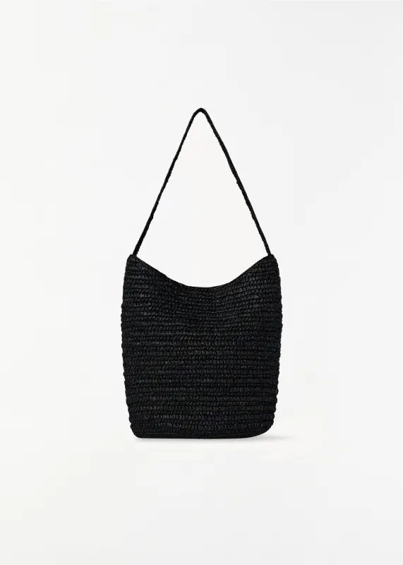Alma Raffia Shoulder Bag — Black made by The Row