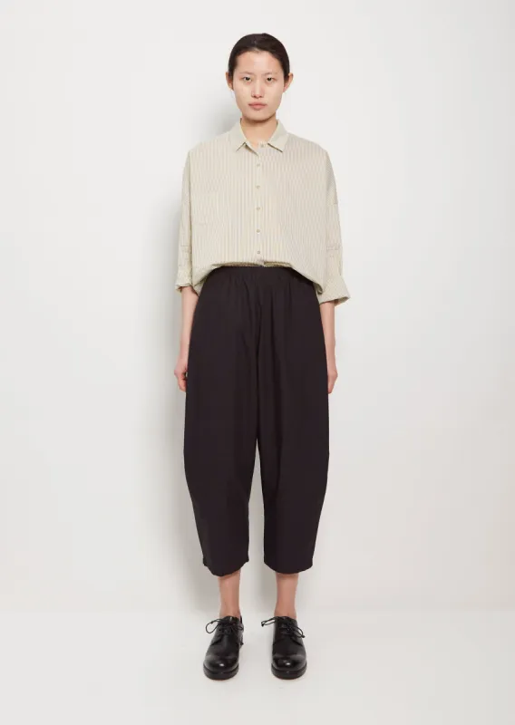 Cropped Cotton Balloon Trousers — Dark sold by La Garconne
