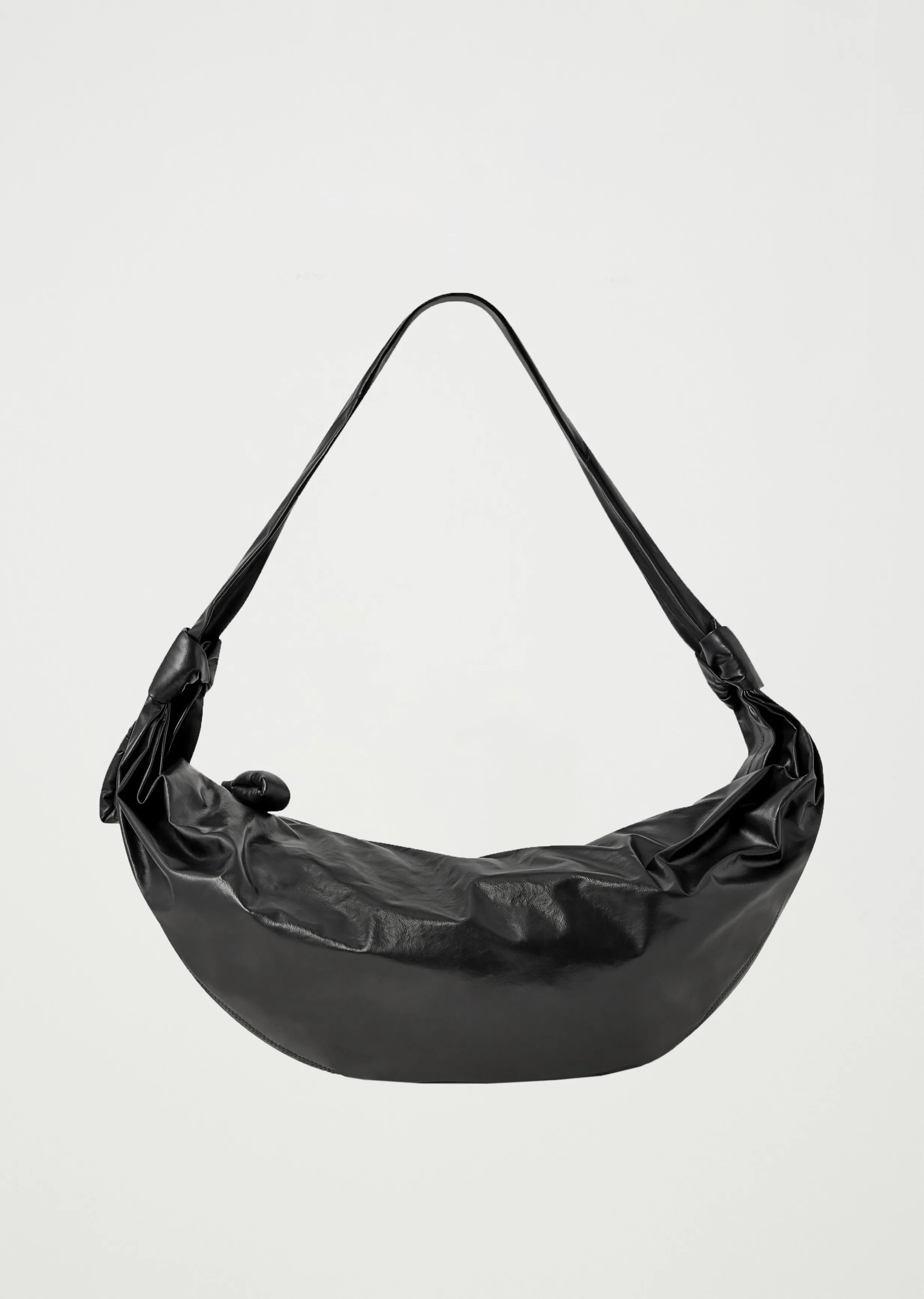 Large Soft Croissant — Black sold by La Garconne