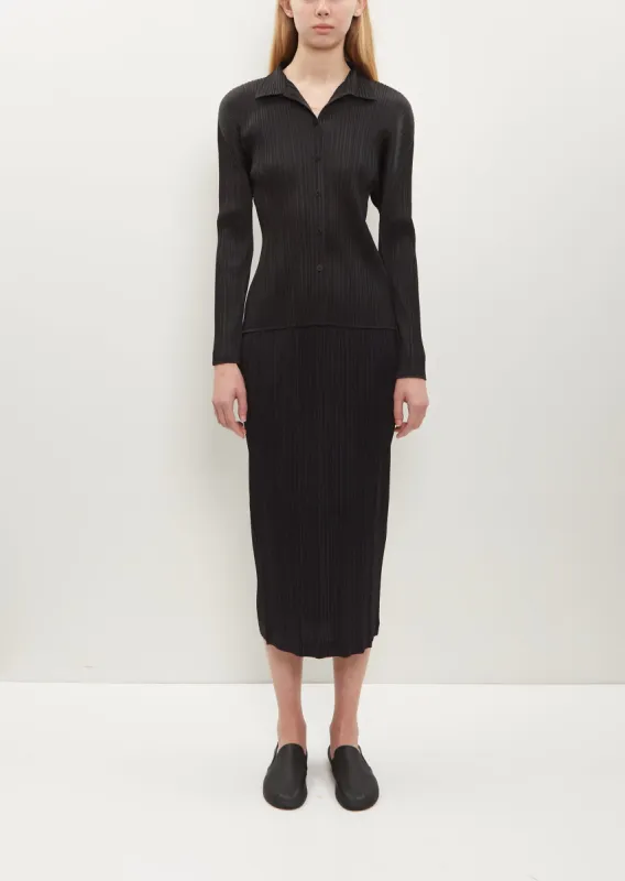 Pleated Midi Skirt sold by La Garconne