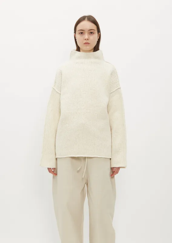 Raw Turtleneck sold by La Garconne