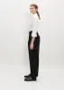 Single Tuck Wide Pants sold by La Garconne