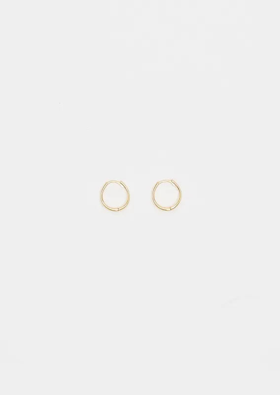 Gold Medium Intrinsic Hoops sold by La Garconne